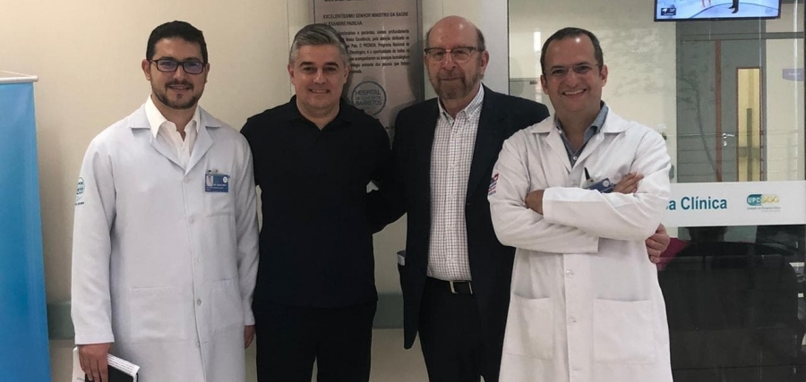 Dr. Franke e Dr. Simon, ao centro, são recebidos pelos Doutores João Neif e Eduardo Zucca 
